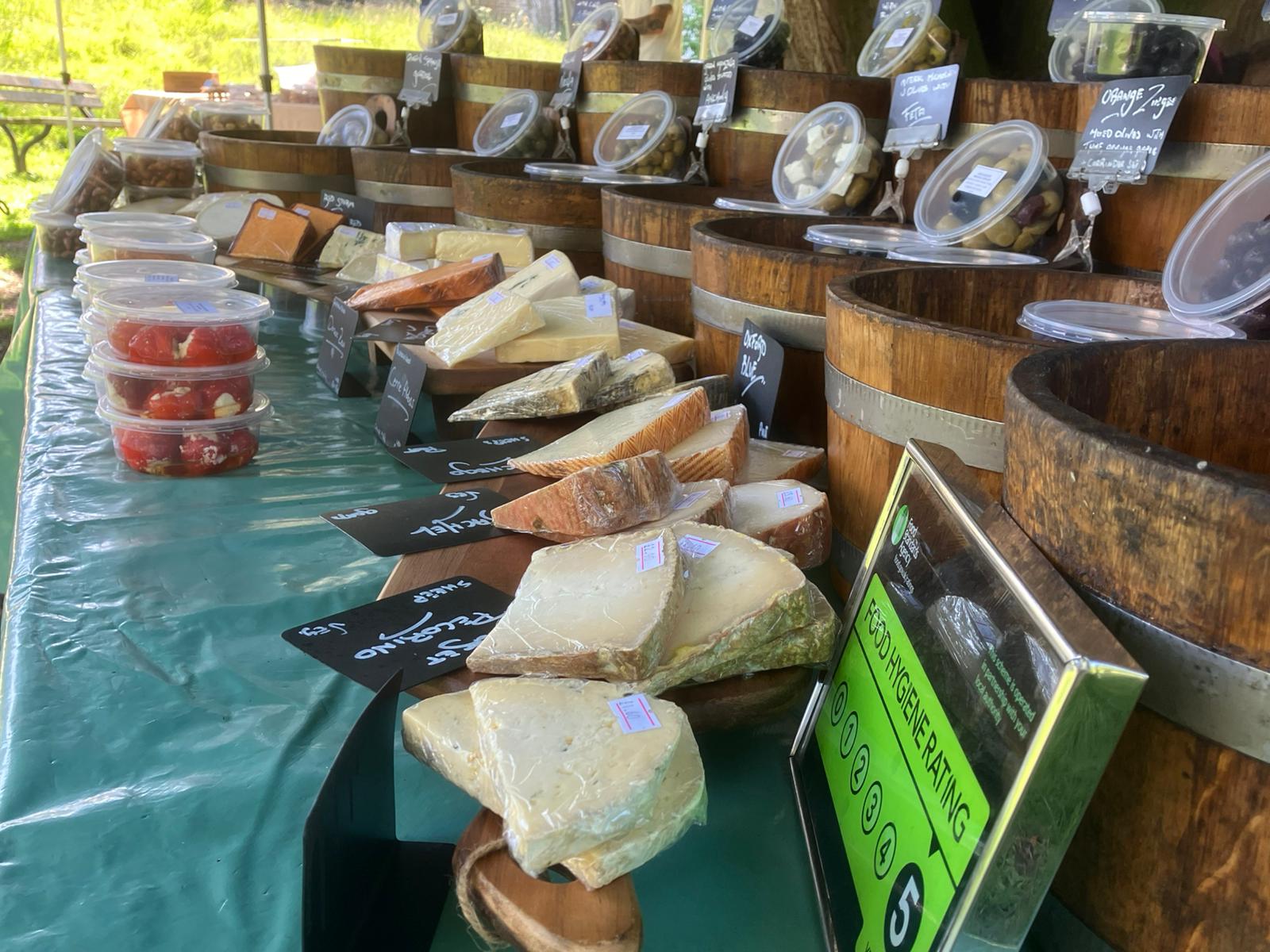 Artisan cheese selection on market display