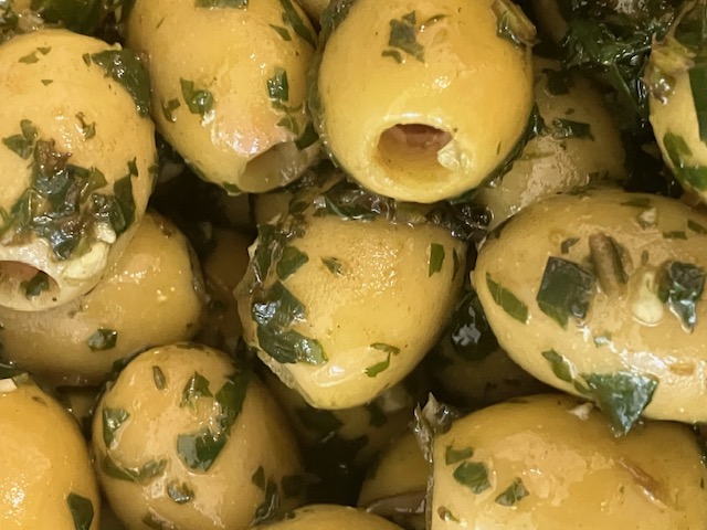 Greek mammoth olives marinated in fresh basil and garlic