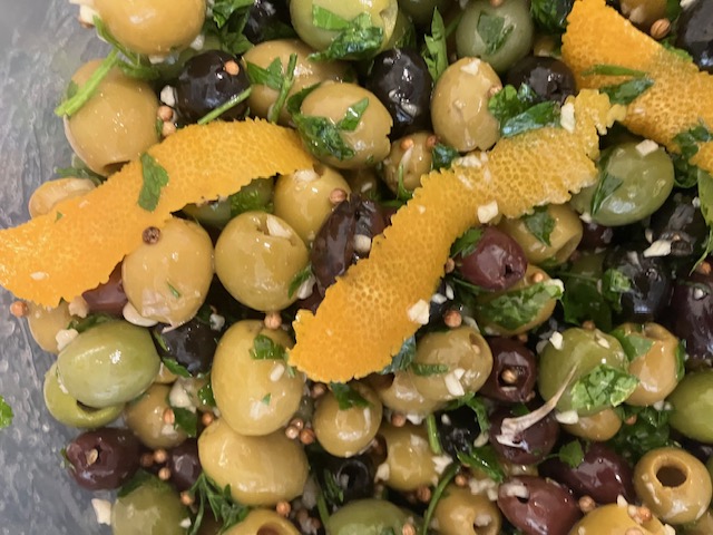 Mediterranean mixed olives with orange zest, coriander seeds and parsley